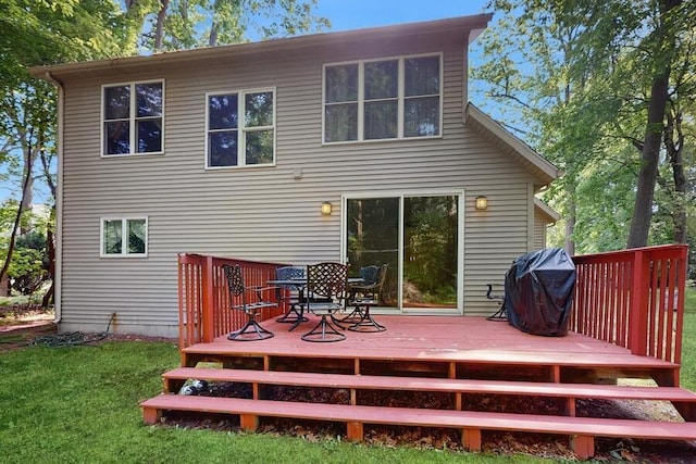 5026 Weatherford Dr, Coloma, MI 49038 - rear view of house with a deck and a lawn