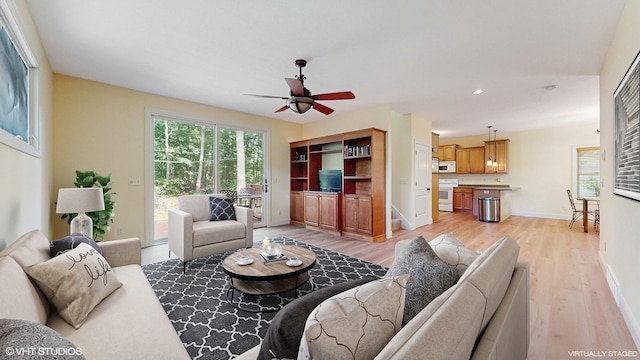 5026 Weatherford Dr, Coloma, MI 49038 - living room with light wood-type flooring, ceiling fan, and recessed lighting