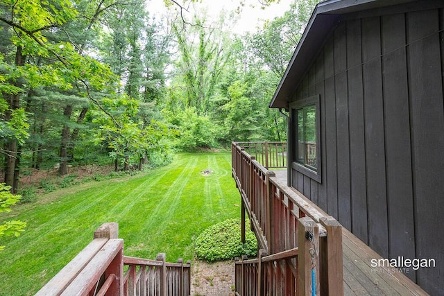 550 Greentree Ln NE, Ada, MI 49301 - view of green lawn with a wooden deck