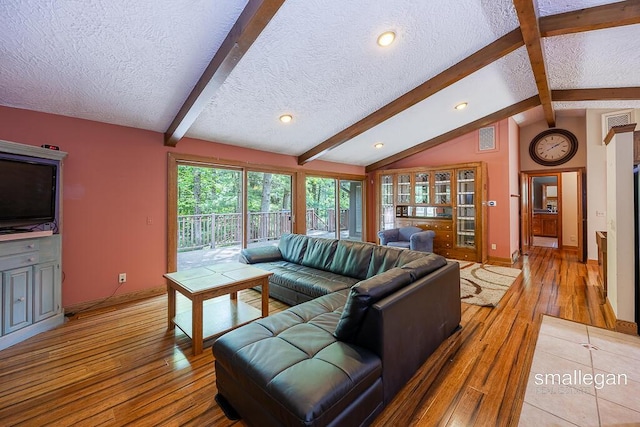 550 Greentree Ln NE, Ada, MI 49301 - living area featuring a textured ceiling, light wood-style flooring, and recessed lighting