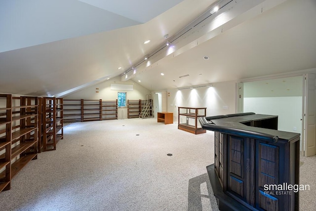 550 Greentree Ln NE, Ada, MI 49301 - additional living space with vaulted ceiling and carpet