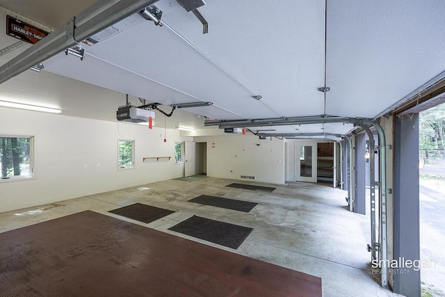 550 Greentree Ln NE, Ada, MI 49301 - garage with a garage door opener