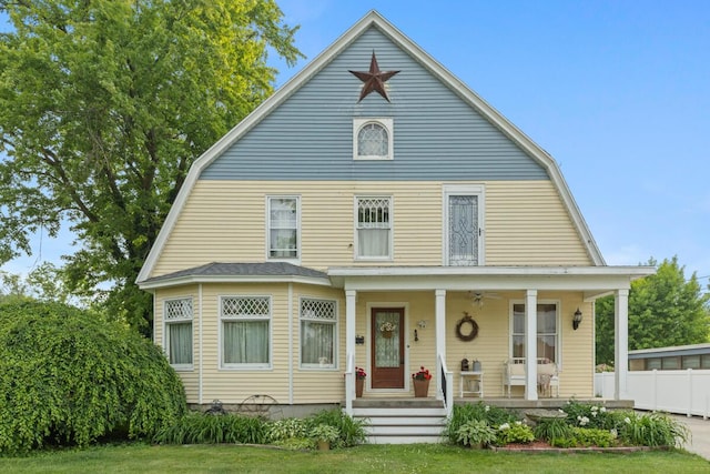 3155 24th Ave, Hudsonville, MI 49426 - dutch colonial featuring a gambrel roof, a porch, and ceiling fan