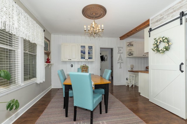 3155 24th Ave, Hudsonville, MI 49426 - dining room with a barn door, a chandelier, dark wood finished floors, and crown molding