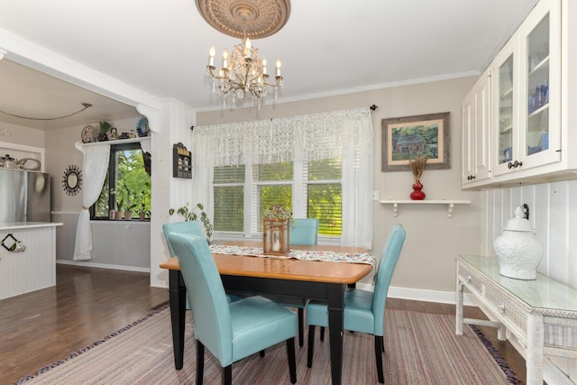 3155 24th Ave, Hudsonville, MI 49426 - dining room with a chandelier, wood finished floors, and crown molding