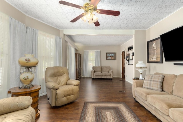 3155 24th Ave, Hudsonville, MI 49426 - living area featuring a ceiling fan, wood finished floors, and ornamental molding