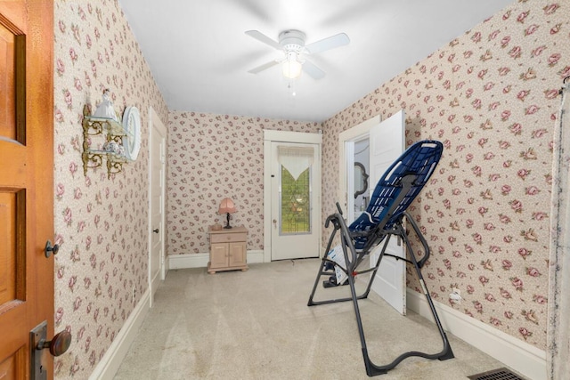 3155 24th Ave, Hudsonville, MI 49426 - exercise area with wallpapered walls, ceiling fan, and carpet floors