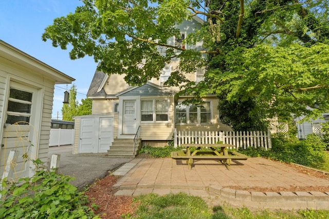 3155 24th Ave, Hudsonville, MI 49426 - rear view of property with a patio area and entry steps
