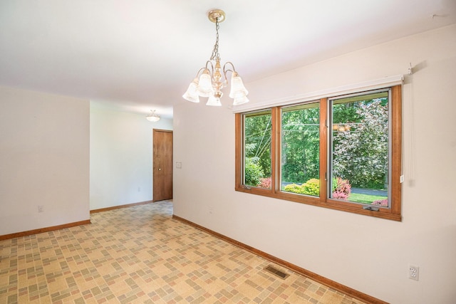 4104 Rurik Dr, Howell, MI 48843 - spare room featuring baseboards and a chandelier