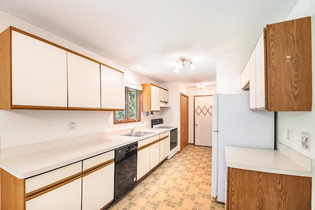 4104 Rurik Dr, Howell, MI 48843 - kitchen featuring white appliances, light countertops, white cabinets, and light floors