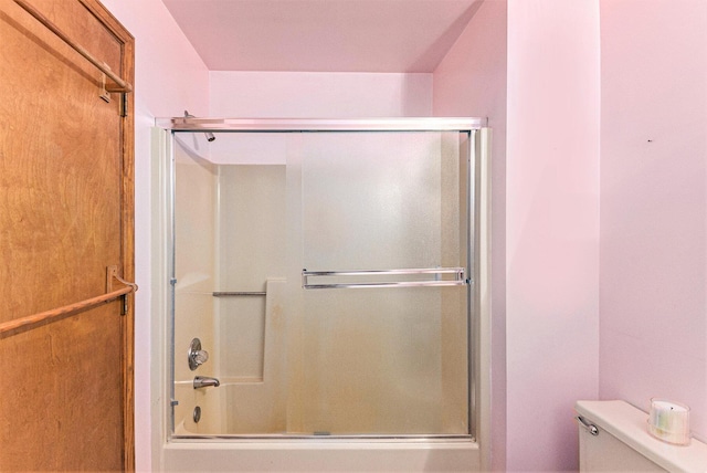 4104 Rurik Dr, Howell, MI 48843 - full bathroom with toilet and bath / shower combo with glass door