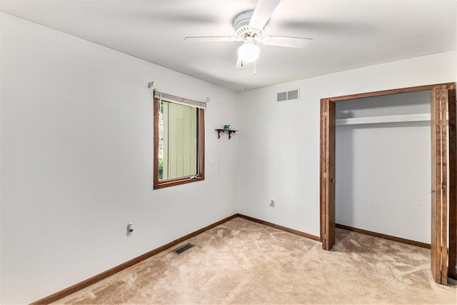 4104 Rurik Dr, Howell, MI 48843 - unfurnished bedroom featuring light colored carpet, a closet, and a ceiling fan