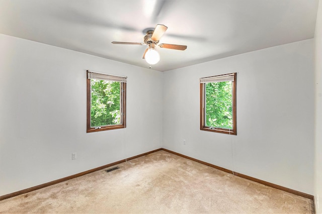 4104 Rurik Dr, Howell, MI 48843 - spare room with light carpet and ceiling fan