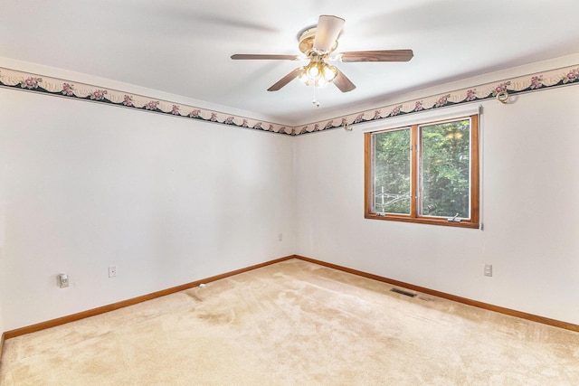 4104 Rurik Dr, Howell, MI 48843 - carpeted spare room featuring baseboards and a ceiling fan