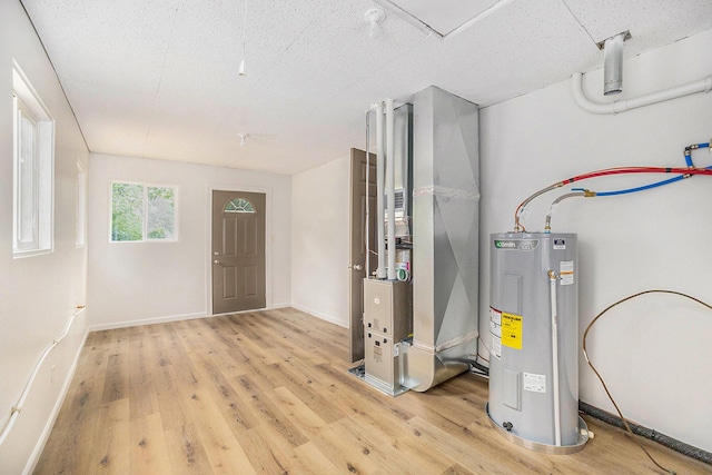 1694 S Mill Iron Rd, Muskegon, MI 49442 - utilities featuring water heater and heating unit