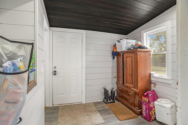 6710 28th Ave, Hudsonville, MI 49426 - entryway with lofted ceiling, wood finished floors, wood ceiling, and wood walls