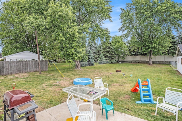 6710 28th Ave, Hudsonville, MI 49426 - fenced backyard featuring a patio area
