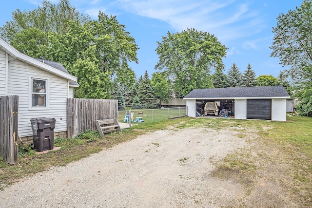 6710 28th Ave, Hudsonville, MI 49426 - exterior space featuring a garage and an outdoor structure