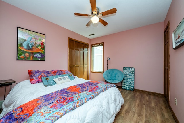 197 Wayne St, Saint Joseph, MI 49085 - bedroom featuring a closet, wood finished floors, and a ceiling fan