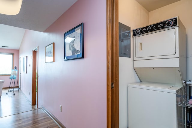 197 Wayne St, Saint Joseph, MI 49085 - washroom with stacked washer / dryer, wood finished floors, and electric panel