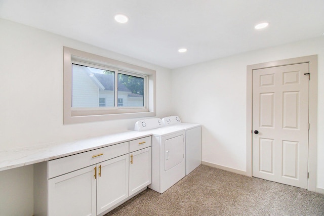 410 Warren Ave, Charlotte, MI 48813 - washroom with washer and clothes dryer, light colored carpet, cabinet space, and recessed lighting