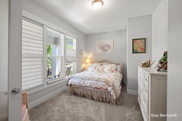 4441 Koinonia Dr NE Unit 3, Grand Rapids, MI 49525 - carpeted bedroom featuring baseboards