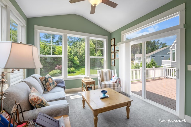 4441 Koinonia Dr NE Unit 3, Grand Rapids, MI 49525 - carpeted living room featuring a ceiling fan and lofted ceiling
