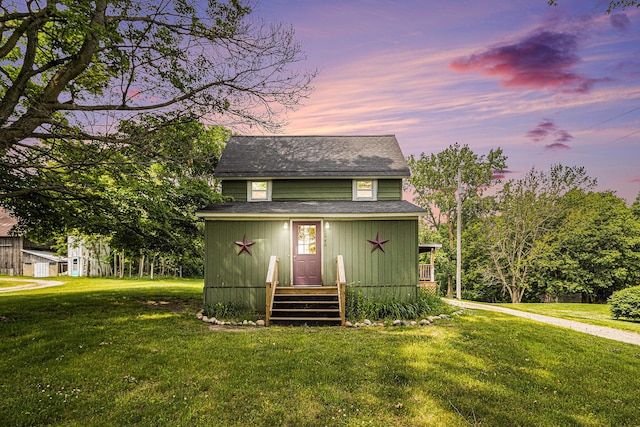 2943 108th Ave, Allegan, MI 49010 - view of front facade with roof with shingles and a front lawn