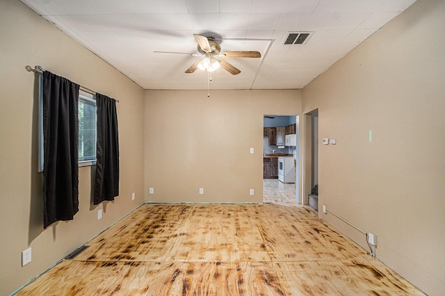 2943 108th Ave, Allegan, MI 49010 - empty room with ceiling fan and wood finished floors