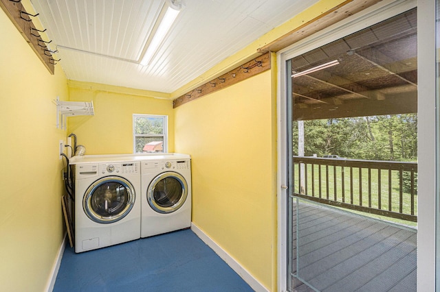 2943 108th Ave, Allegan, MI 49010 - laundry room featuring washer and dryer and baseboards