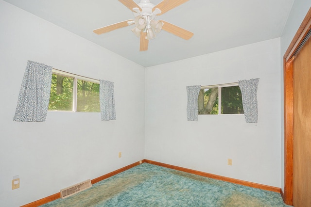 246 Ridgeway Rd, Jackson, MI 49202 - spare room featuring carpet floors and ceiling fan