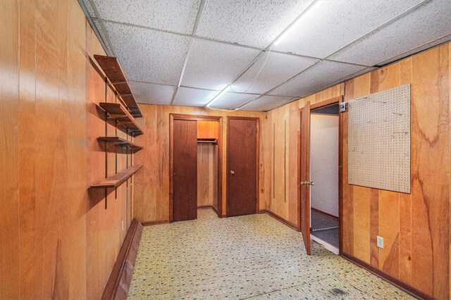 246 Ridgeway Rd, Jackson, MI 49202 - hall featuring wooden walls and light floors