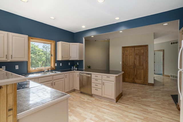6483 N 144th Ave, Walkerville, MI 49459 - kitchen featuring stainless steel dishwasher, a peninsula, light wood-style floors, and recessed lighting