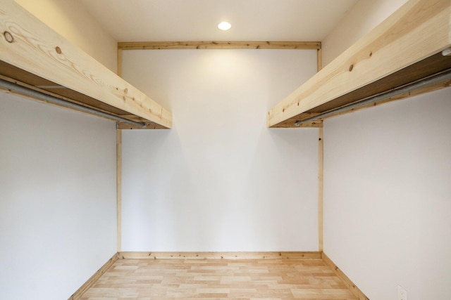 6483 N 144th Ave, Walkerville, MI 49459 - spacious closet featuring light wood-style flooring