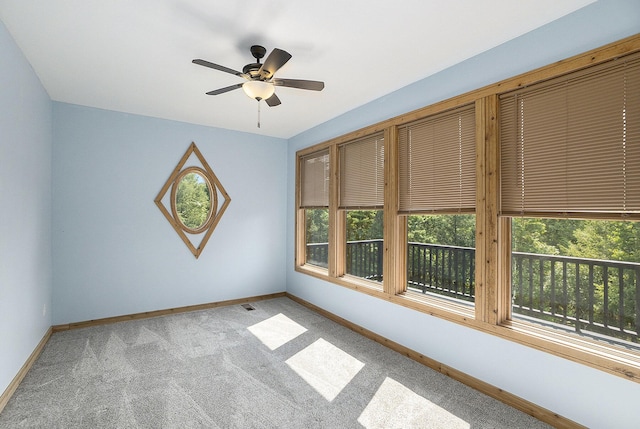 6483 N 144th Ave, Walkerville, MI 49459 - unfurnished room with plenty of natural light, carpet floors, and ceiling fan
