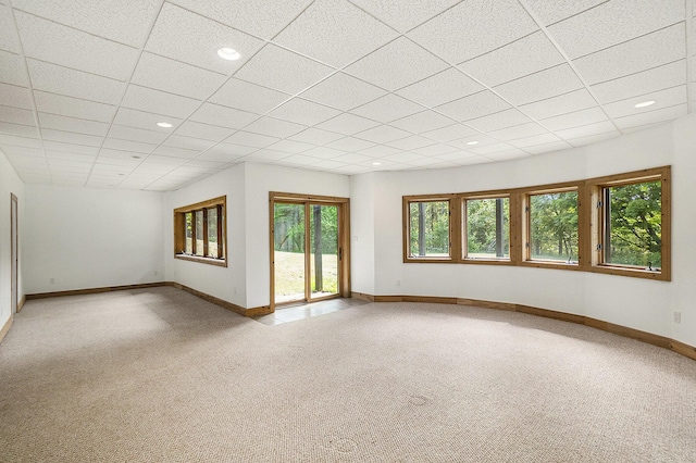 6483 N 144th Ave, Walkerville, MI 49459 - empty room featuring light colored carpet, a drop ceiling, and recessed lighting
