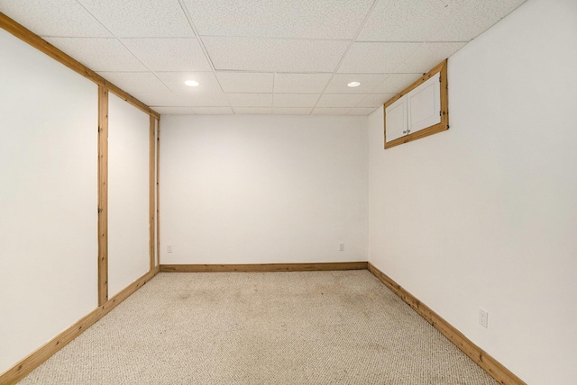 6483 N 144th Ave, Walkerville, MI 49459 - finished basement with a paneled ceiling, light carpet, and recessed lighting