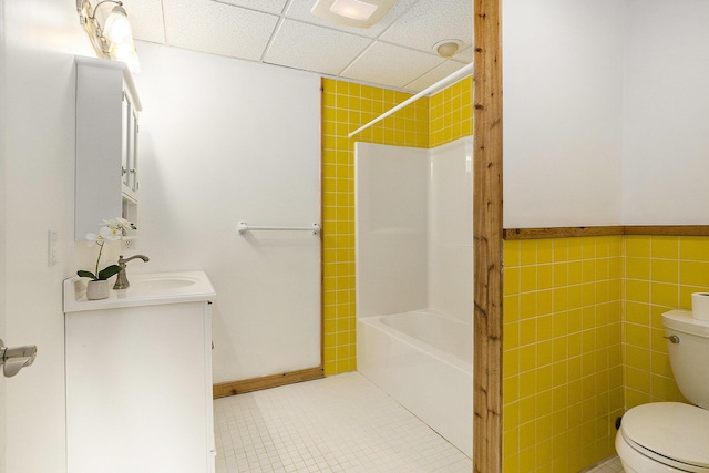 6483 N 144th Ave, Walkerville, MI 49459 - full bath with vanity, bathing tub / shower combination, a drop ceiling, tile patterned floors, and tile walls