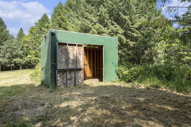 6483 N 144th Ave, Walkerville, MI 49459 - view of outdoor structure featuring a forest view