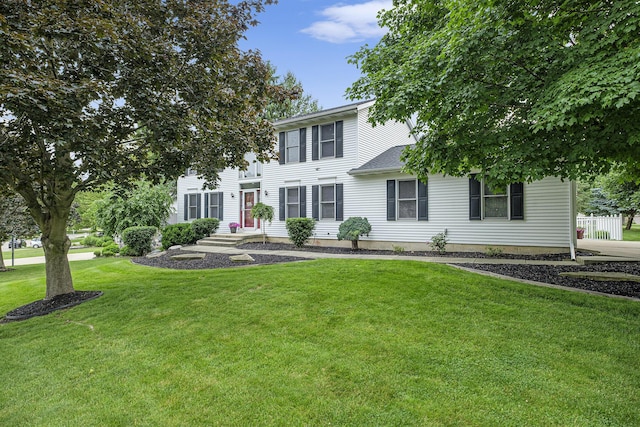1863 Sunvale Dr SW, Wyoming, MI 49519 - colonial-style house featuring a front yard