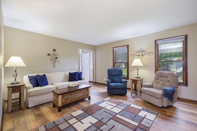 1863 Sunvale Dr SW, Wyoming, MI 49519 - living area featuring hardwood / wood-style floors and baseboards