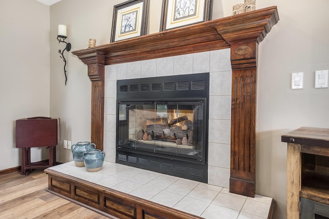 1863 Sunvale Dr SW, Wyoming, MI 49519 - detailed view of a tiled fireplace and wood finished floors