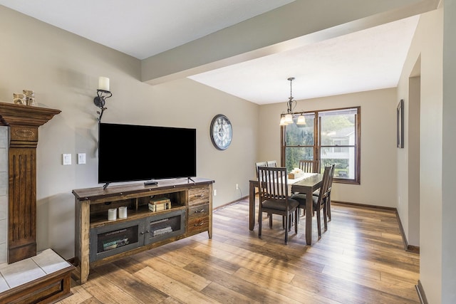 1863 Sunvale Dr SW, Wyoming, MI 49519 - dining room with wood finished floors and a chandelier