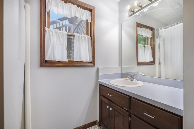 1863 Sunvale Dr SW, Wyoming, MI 49519 - bathroom featuring vanity and plenty of natural light