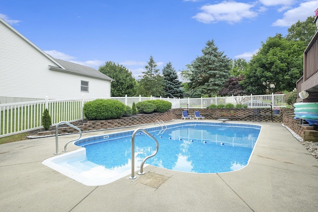 1863 Sunvale Dr SW, Wyoming, MI 49519 - view of swimming pool featuring a fenced backyard and a patio area