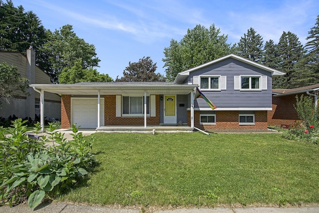 8683 Hemlock Ct, Ypsilanti, MI 48198 - tri-level home featuring a garage, brick siding, a front yard, and a porch