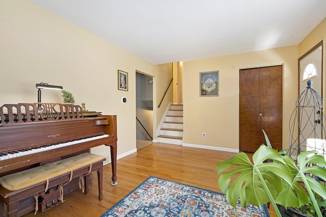 8683 Hemlock Ct, Ypsilanti, MI 48198 - entryway with stairway and wood finished floors