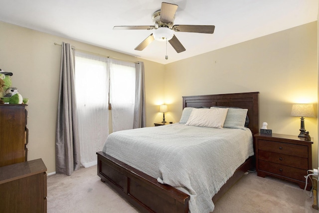 8683 Hemlock Ct, Ypsilanti, MI 48198 - bedroom with light colored carpet and a ceiling fan