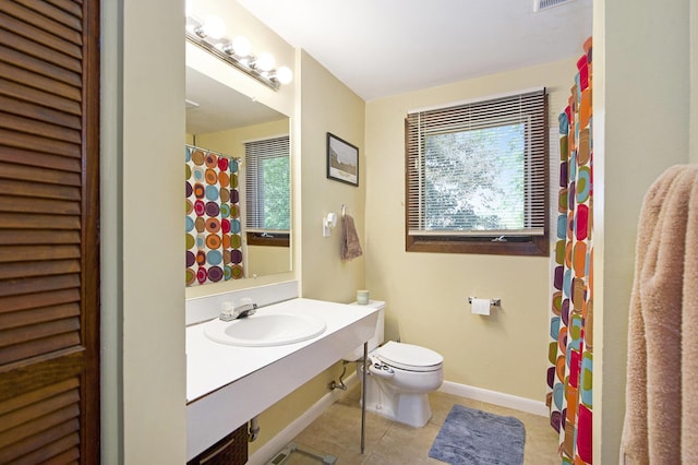 8683 Hemlock Ct, Ypsilanti, MI 48198 - bathroom with tile patterned floors, vanity, and a shower with curtain