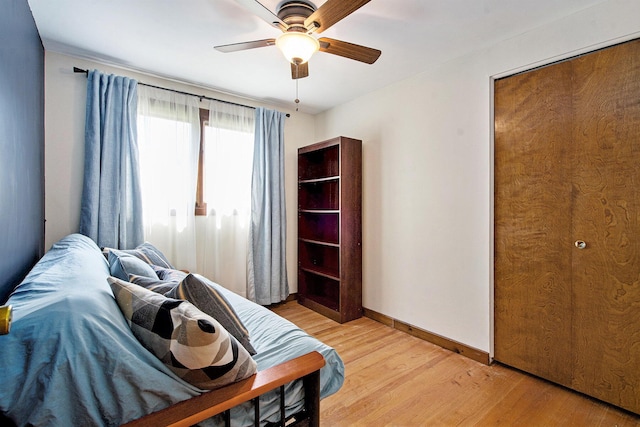 8683 Hemlock Ct, Ypsilanti, MI 48198 - bedroom with light wood finished floors and a ceiling fan